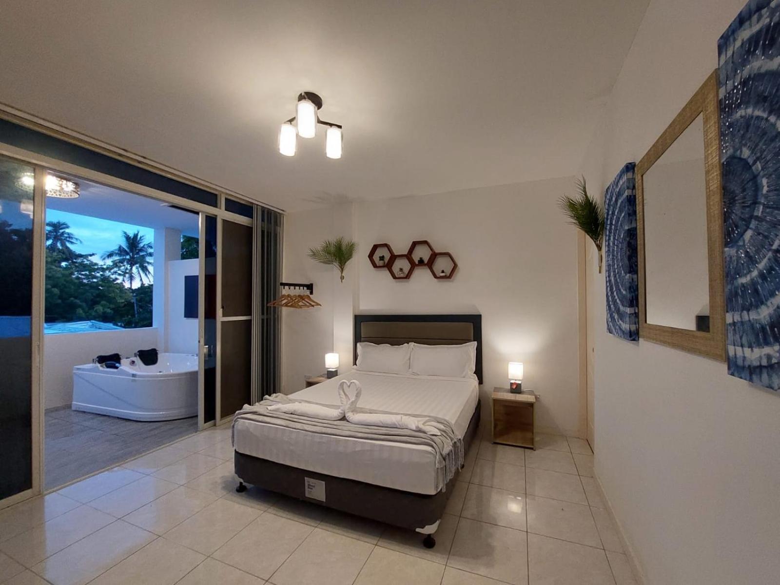 Bonsai Jacuzzi Suites Panglao Exterior photo